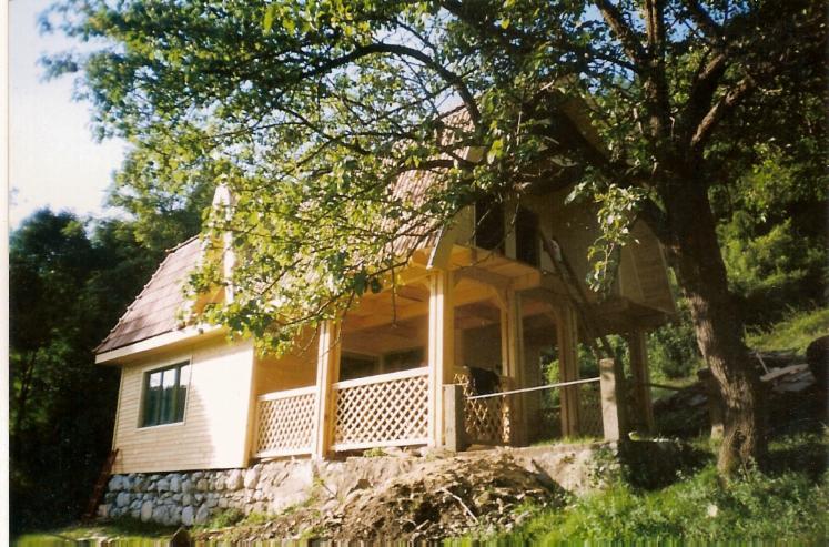 Square milled log house
