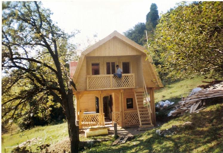 Square milled log house