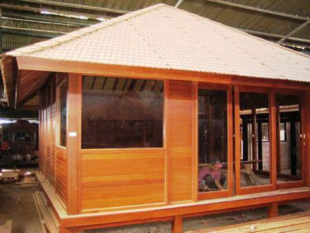 Square milled log house