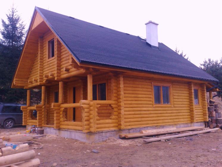 Square milled log house